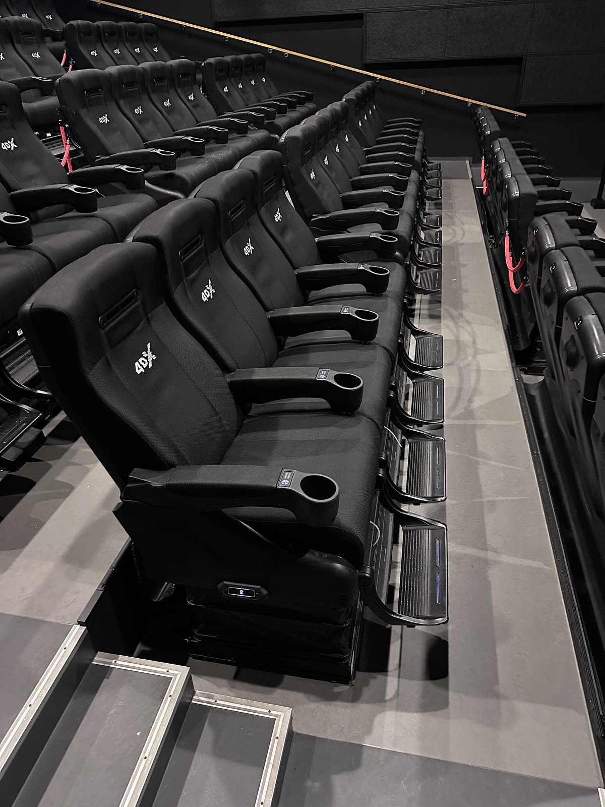 4DX seats in cinema (motion and environmental effects synced with the on-screen action) bench rows in a movie theater hall Kinostoler kinosal Kilden kino Tønsberg, Norway 2023 IMG 7852 — 하이브 씨네 페스트 어디서 보나 — 상영관·극장